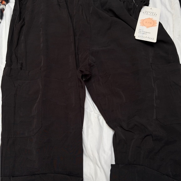 Nice nylons black material jogger style but nice enough to wear otherwise - Picture 3 of 4